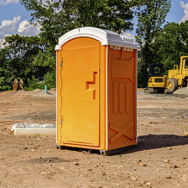 what is the cost difference between standard and deluxe porta potty rentals in Bynum